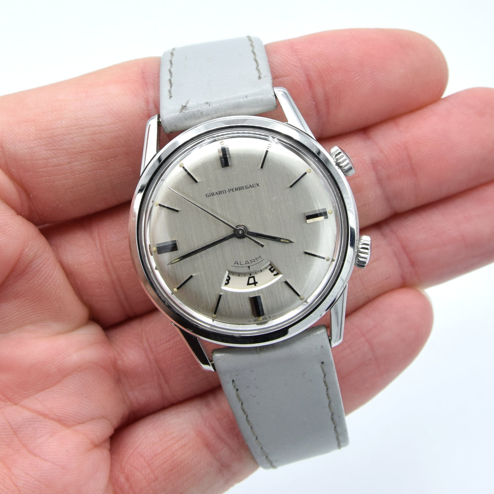 (RESERVED) Girard-Perregaux rare swiss Alarm classic wristwatch in Stainless Steel Circa 1960s 35mm
