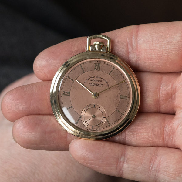 1938 Movado Ultra slim Solid 9ct Gold Art Deco Pocket Watch, Retailed by The Goldsmiths & Silversmiths Co. Ltd